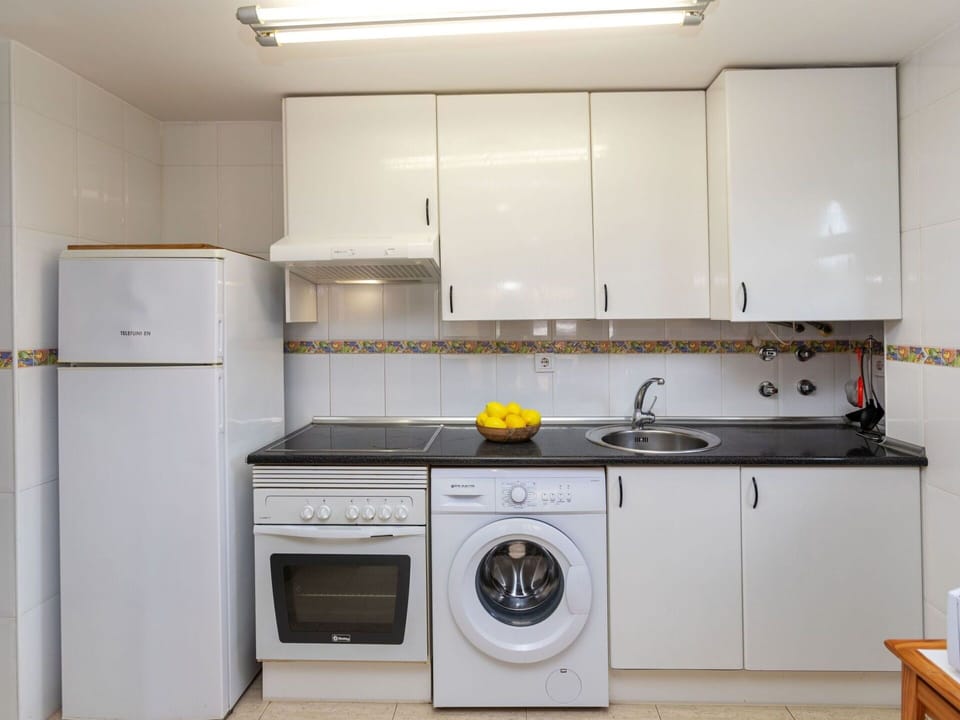 Cabinetry, Property, Laundry Room, White, Sink, Kitchen Stove, Kitchen Sink, Kitchen, Countertop, Home Appliance