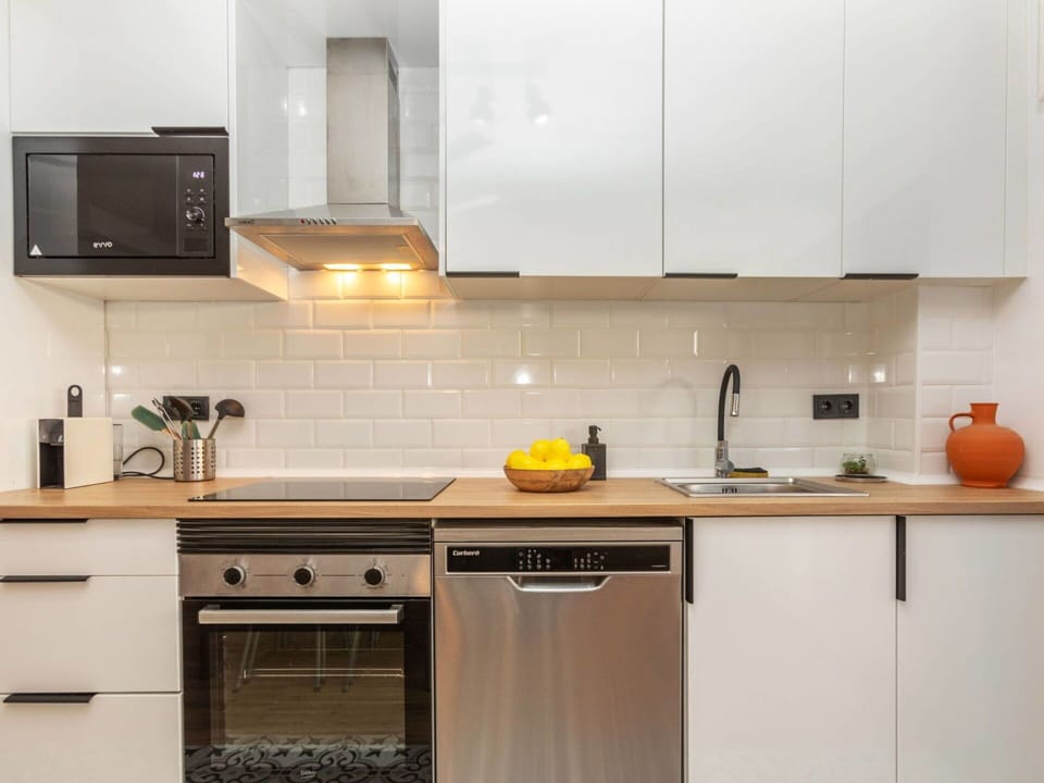 Kitchen Appliance, Kitchen, Countertop, Cabinetry, Major Appliance, Furniture, Kitchen Stove, Home Appliance, Interior Design, Stove