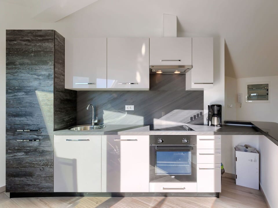 Cabinetry, Countertop, Property, Building, Kitchen Appliance, Kitchen Stove, Kitchen, Sink, Home Appliance, Wood