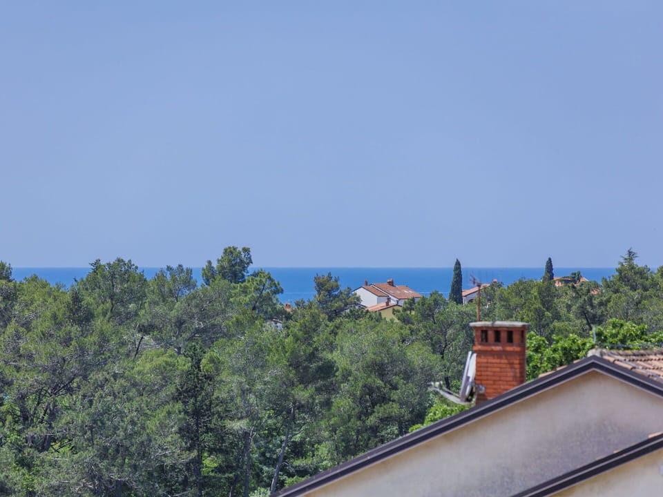 Sky, Building, Tree, Water, House, Roof, Window, City, Tower, Landscape