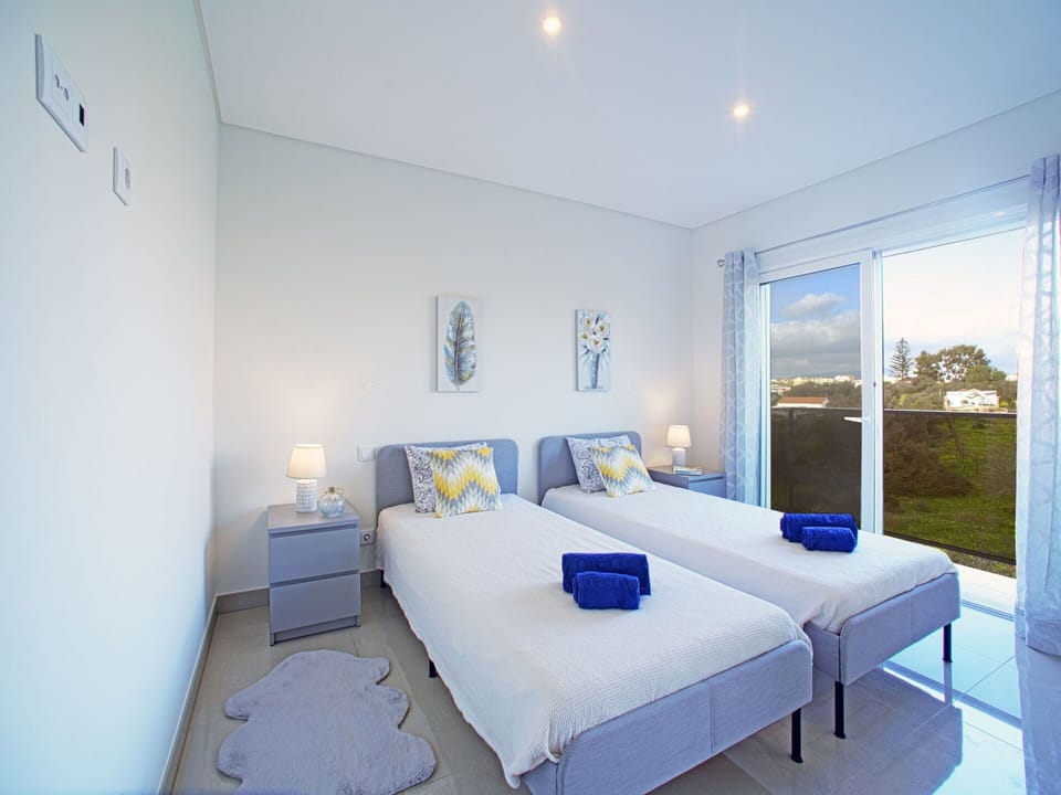 Furniture, Building, Window, Comfort, Azure, Lighting, Cabinetry, Interior Design, Bed Frame, Architecture