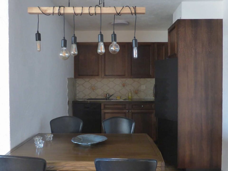Property, Furniture, Cabinetry, Table, Wood, Lighting, Interior Design, Chair, Countertop, Living Room