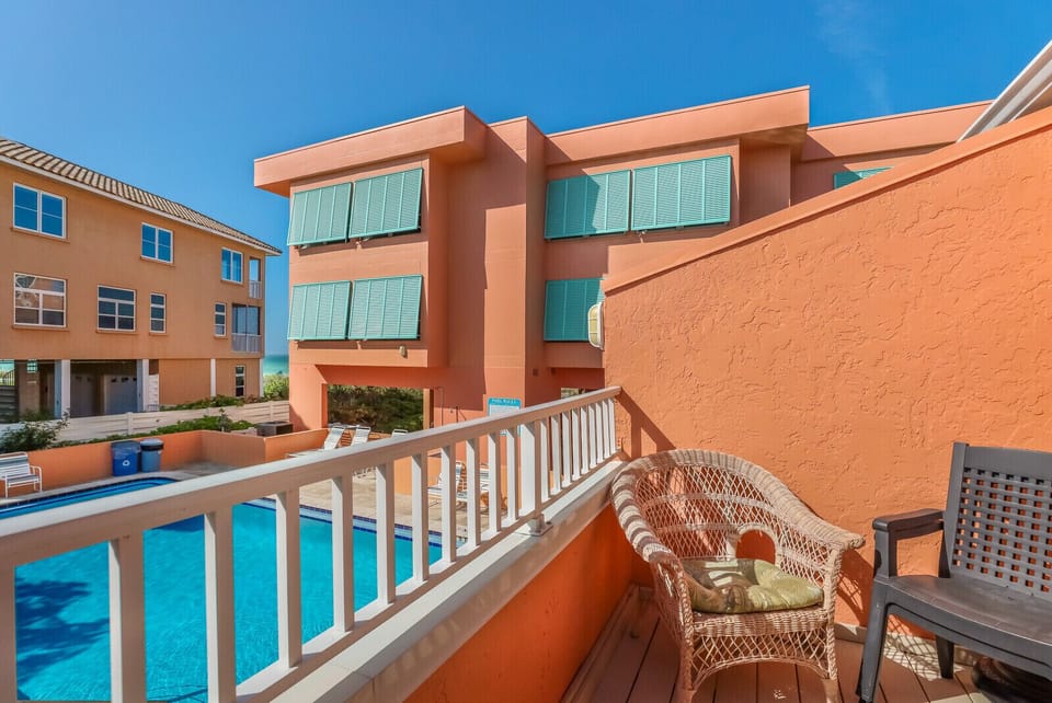 Balcony overlooking the pool and Gulf