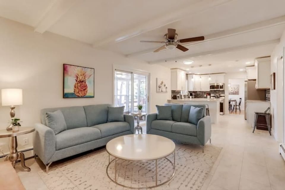 Second family room with smart TV, adjacent to kitchen