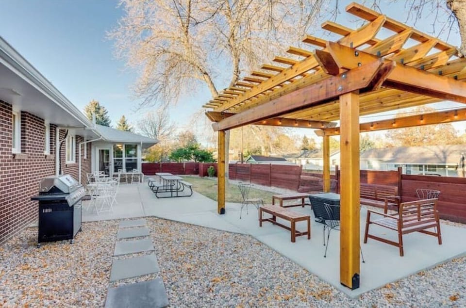 Large back patio for cooking and relaxing outside