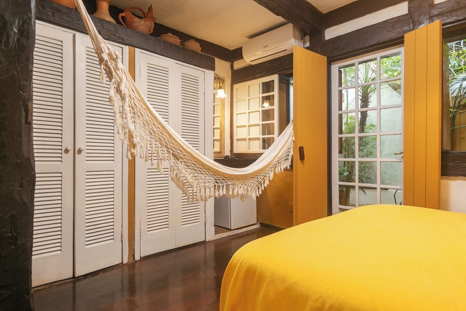 Suite Varanda | Minibar, free WiFi, bed sheets