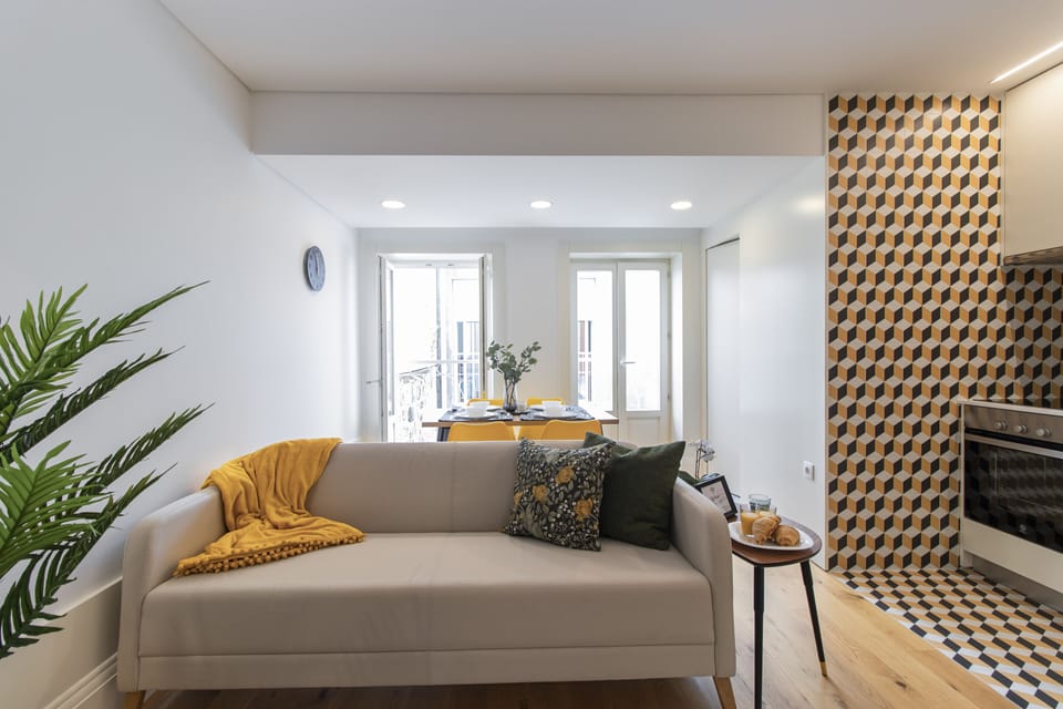 Deluxe Studio | Living area | Flat-screen TV