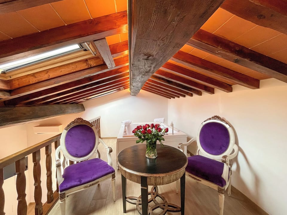 Premium Studio Suite | Living area | 32-inch flat-screen TV with satellite channels, TV