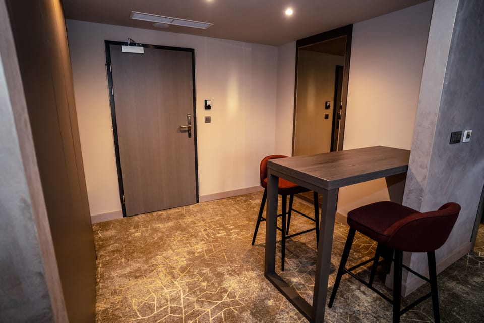 Deluxe Double Room | In-room safe, desk, laptop workspace, blackout drapes