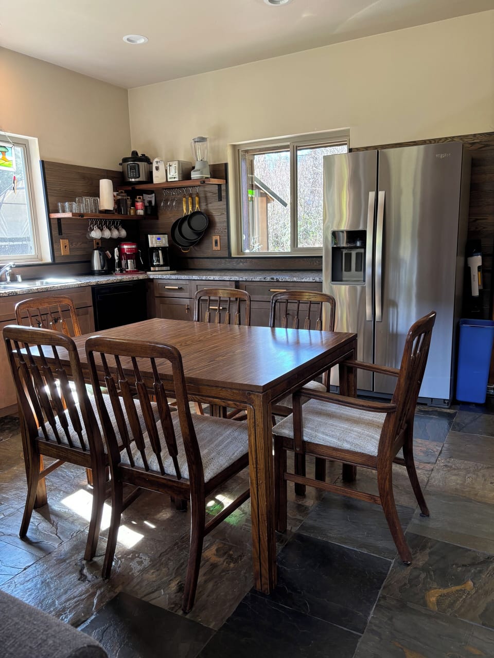 Table seats 8. 2 additional leaves available to expand eating area