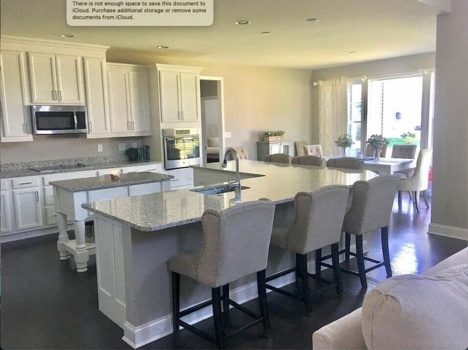 Gourmet Kitchen w Stainless Steel Appliances and Granite Countertops
