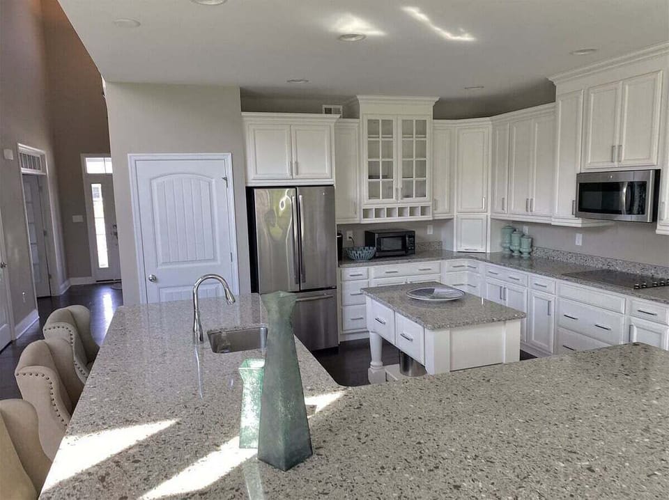 Gourmet Kitchen w Stainless Steel Appliances and Granite Countertops