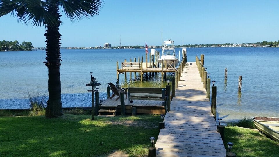 Access to large backyard,  private dock and fishing.
