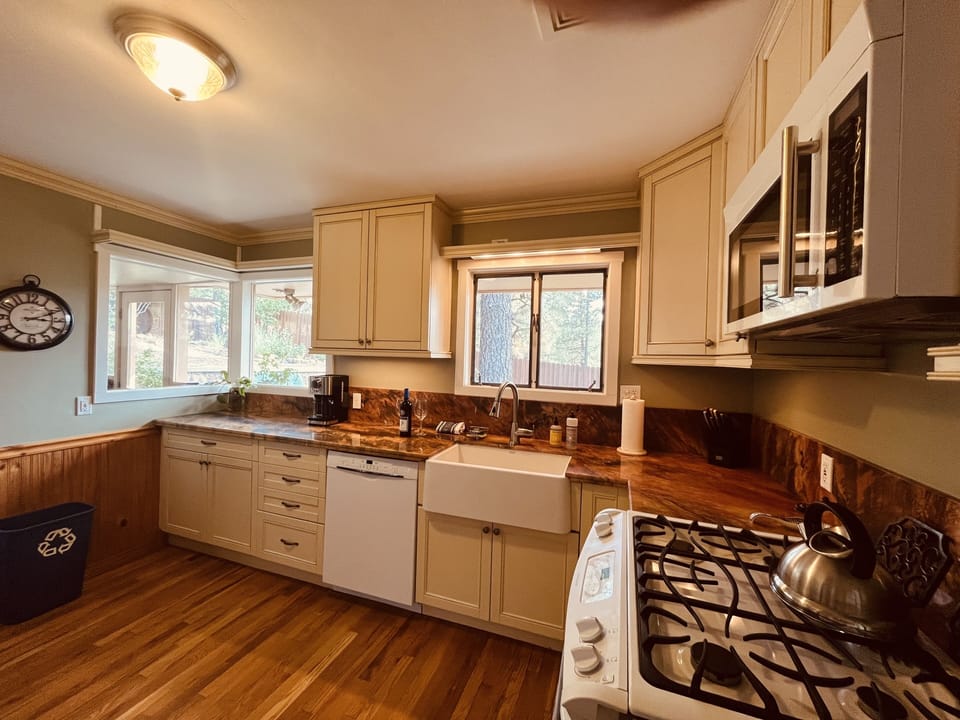 Fully equipped kitchen with gas range and dishwasher
