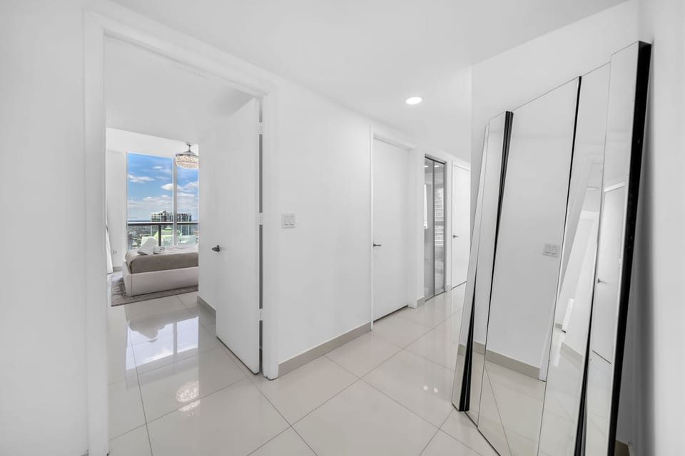 Spacious entrance with a huge mirror!