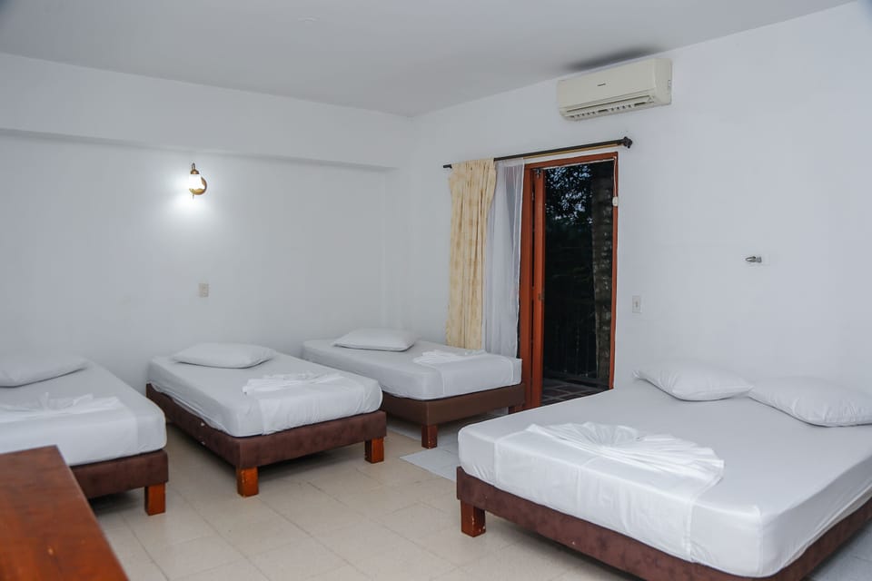 Family Room, Garden View | WiFi (free), bed sheets