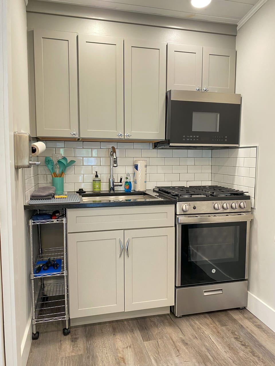 Full kitchen with Gas Stove, full size microwave & the Essentials 