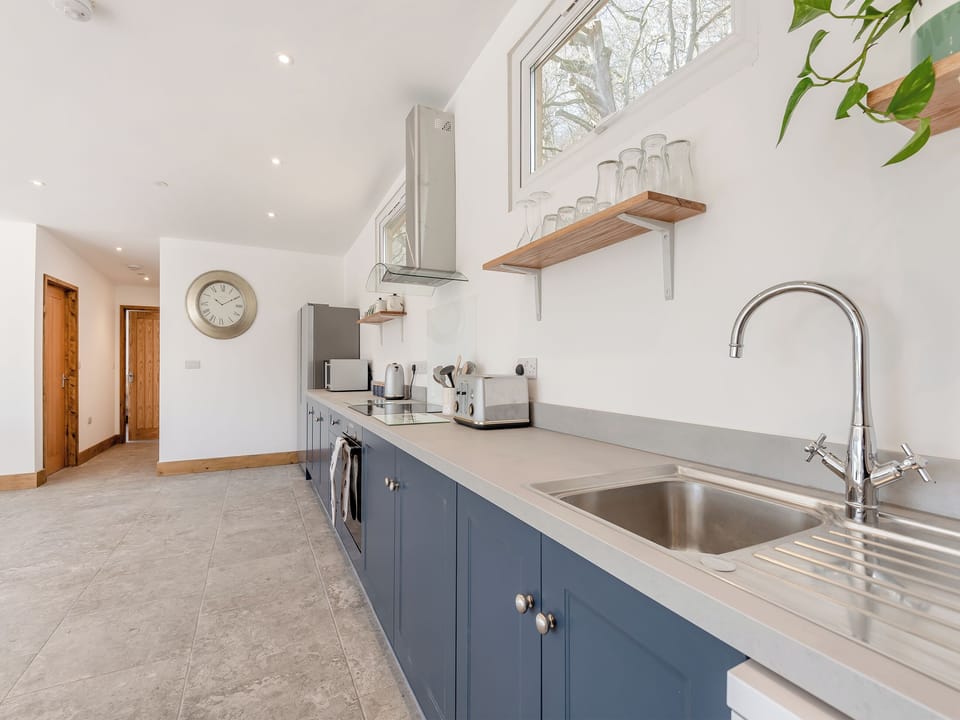 Kitchen area | Larchwood Lodge - Acre Luxury Lodges, Stanner, near Kington