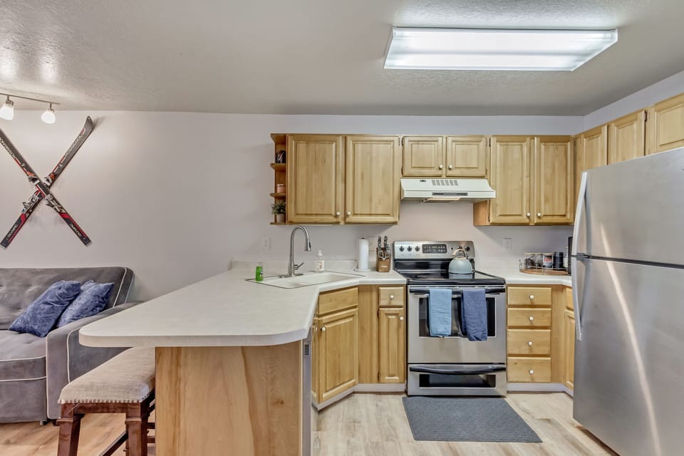 Full kitchen and supplies! Mini waffle maker, drip coffee, and automatic coffee.
