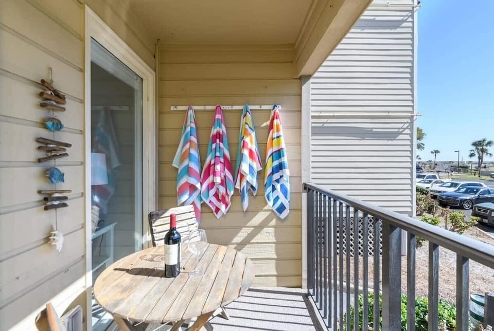A tranquil outdoor space equipped with a bistro set, ideal for morning coffee