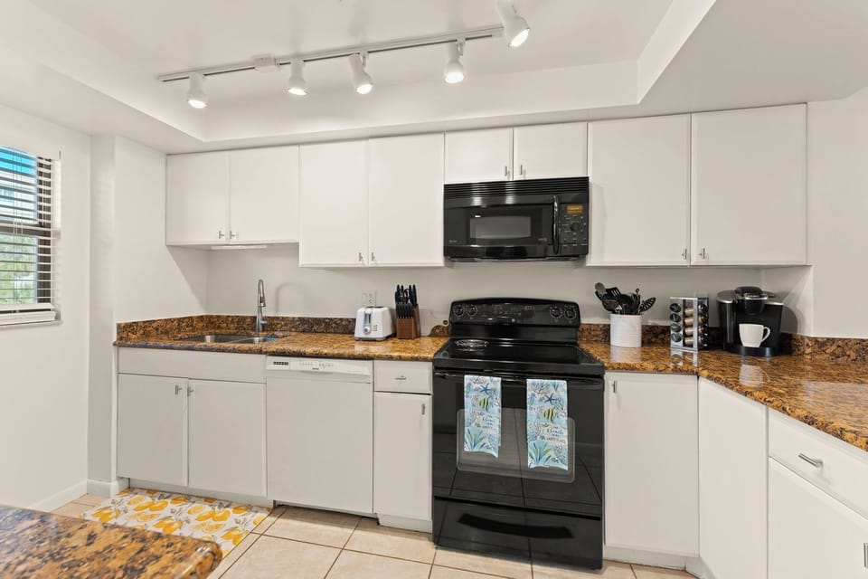 Fully equipped kitchen, ready for home-cooked meals and gatherings.
