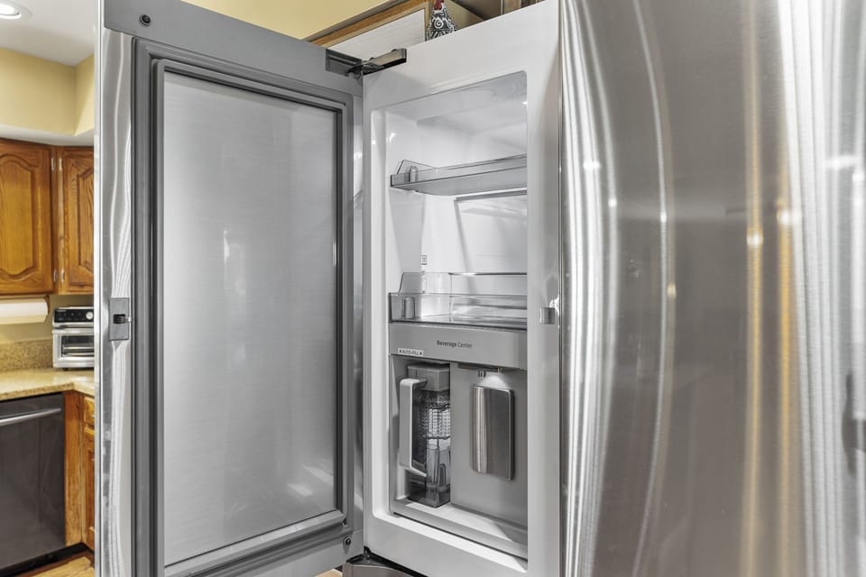 Beverage Station door with self filling water pitcher and easy access shelves