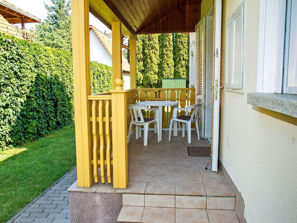 Plant, Building, Chair, Wood, Interior Design, Shade, Porch, Grass, Tree, Real Estate