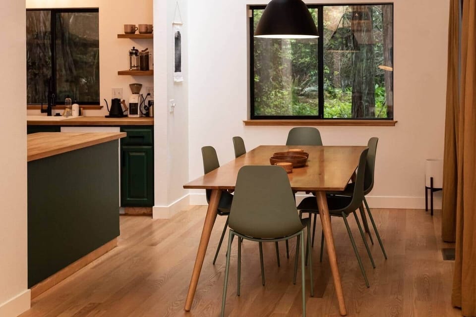 Dining room comfortable seats 6 with beautiful forest views.