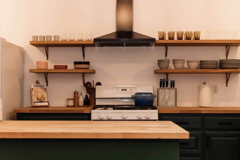 Refreshed kitchen with all the supplies you need to cook at home.