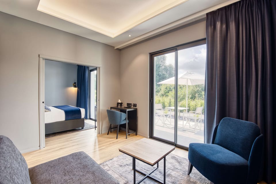 Deluxe Suite, 1 King Bed, Non Smoking, Golf View (with Sofabed) | Premium bedding, minibar, in-room safe, desk