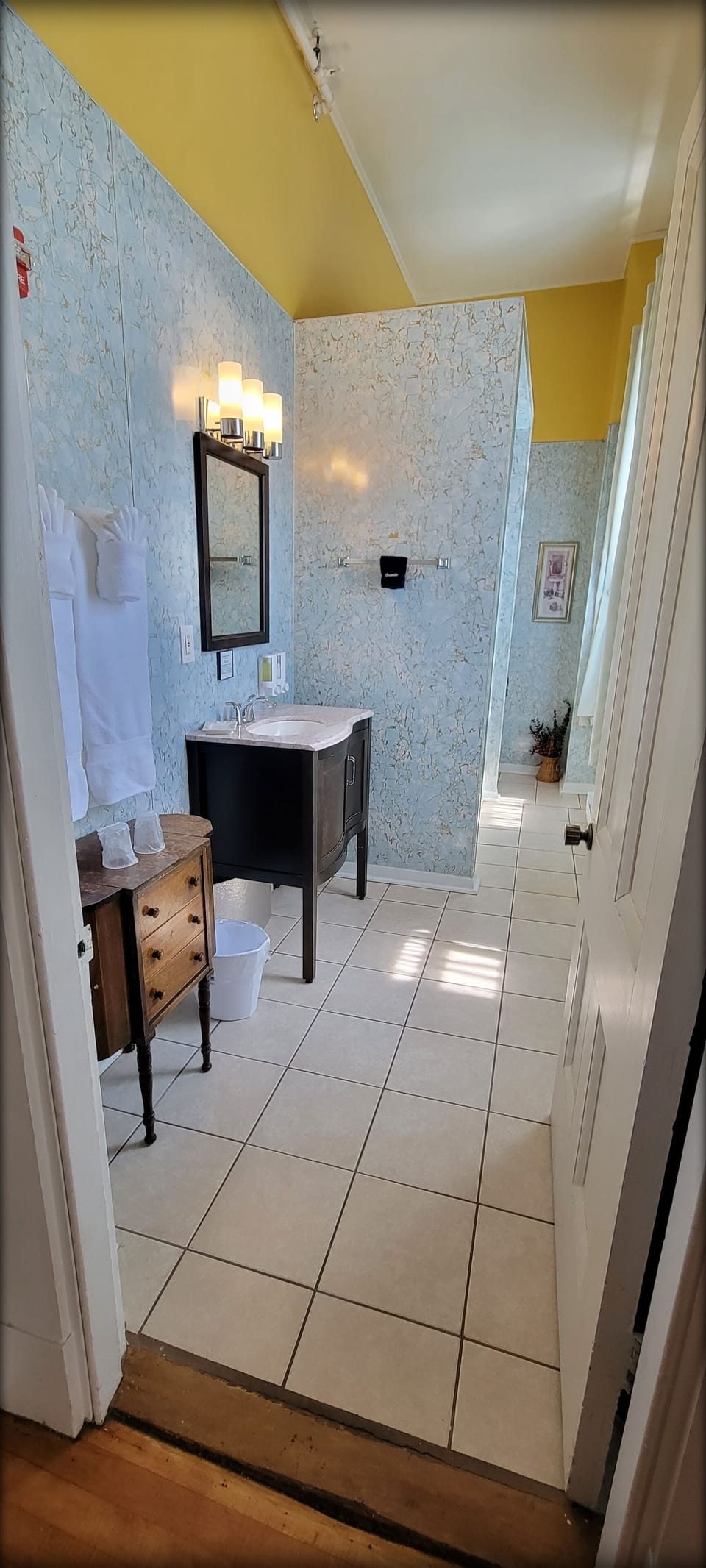 Designer toiletries, hair dryer, bathrobes, slippers