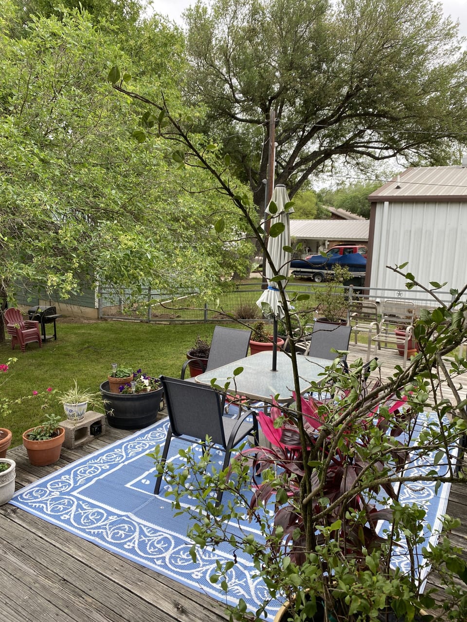Large back deck for entertaining with spotlights for evenings outdoors