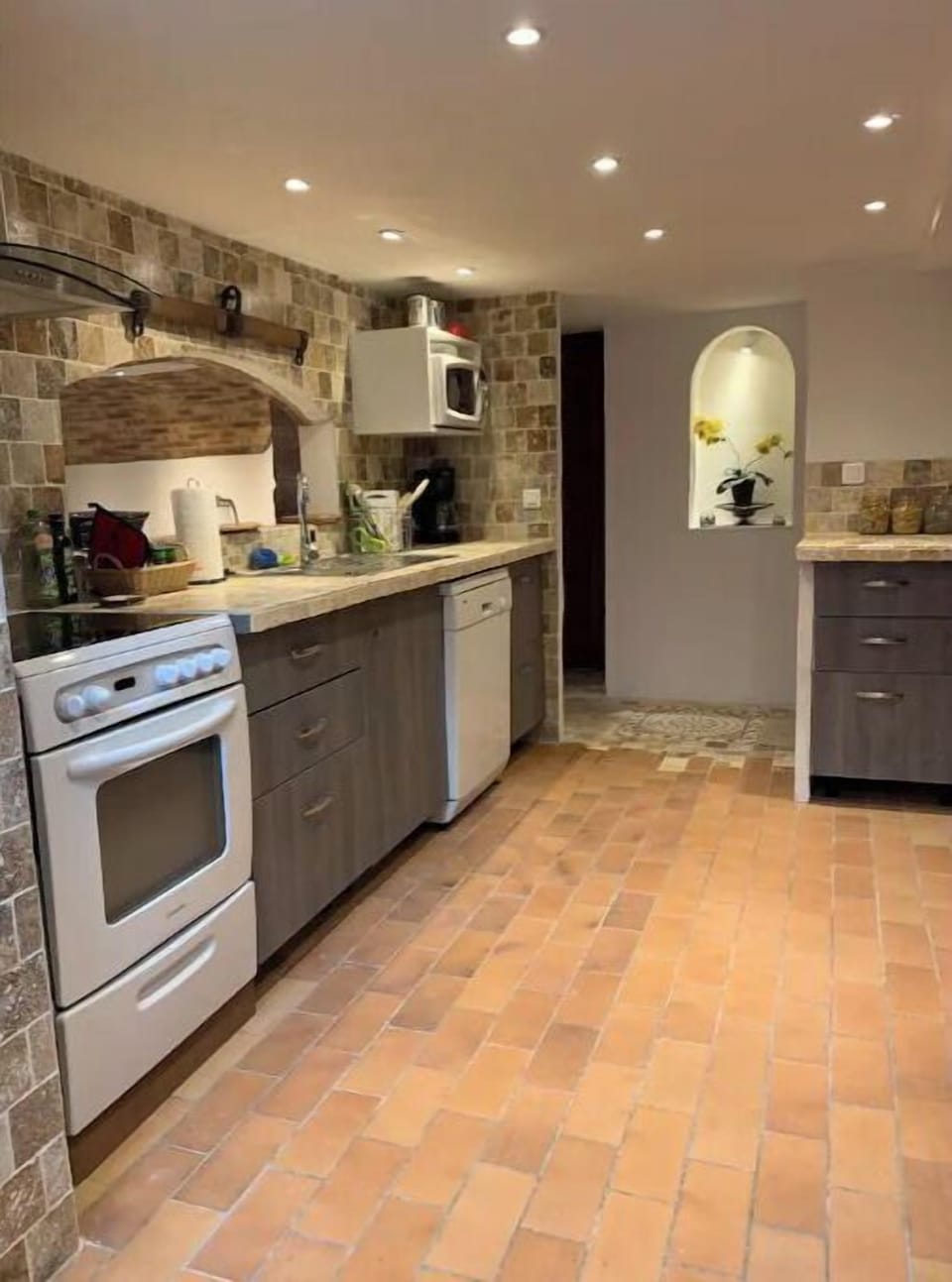 Hallway to salon and kitchen, laundry and double bedroom with mezzanine bed