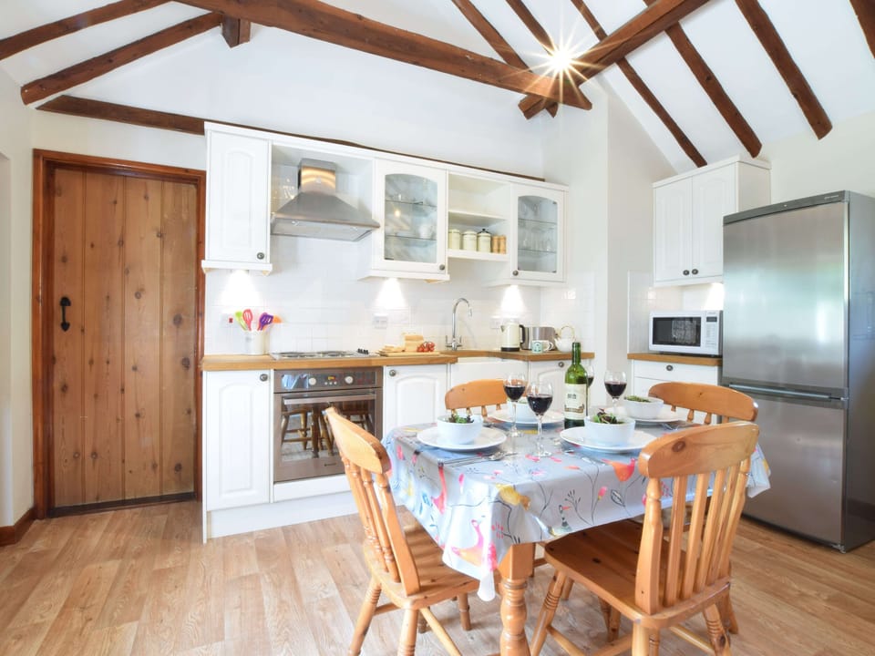 Fridge, electric kettle, toaster, cookware/dishes/utensils