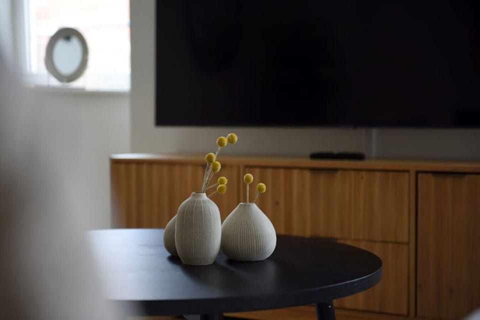 Stylish vases add a touch of elegance to the living space.
