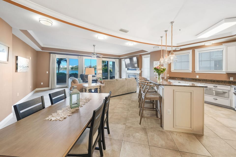 Your open-concept living space flows seamlessly from kitchen to dining to living room, perfect for gathering with family and friends.
