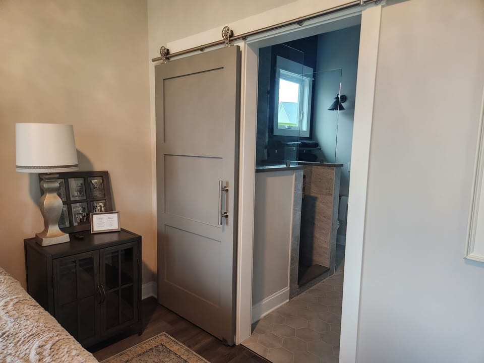 Barn door to bathroom