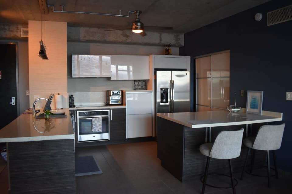 Kitchen - Laundry Area is Behind the Sliding Doors