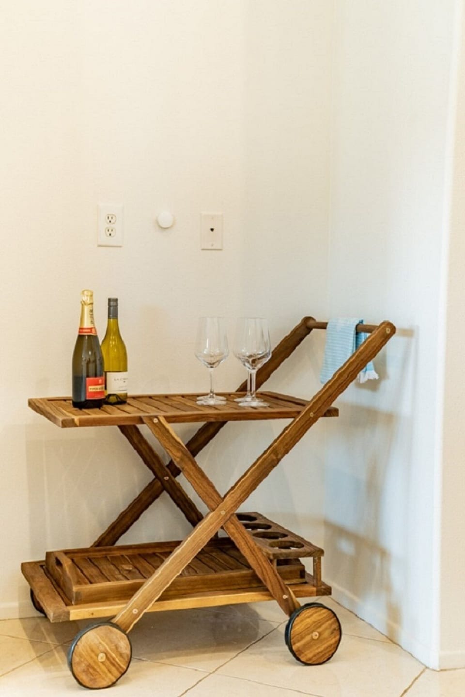 Bar kart that can be wheeled outside for drinks by the pool!