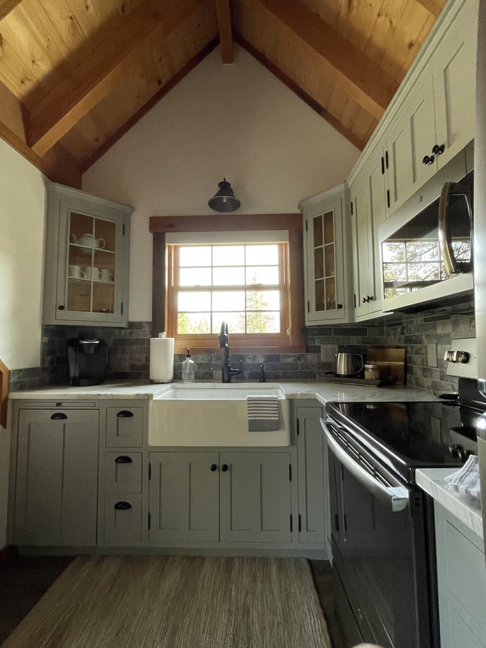 Custom cabinets with quartzite counter top & farm house sink, with a view!