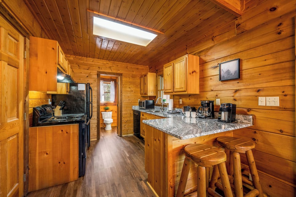 The first floor bathroom is accessible off the kitchen or the first floor bedroom.