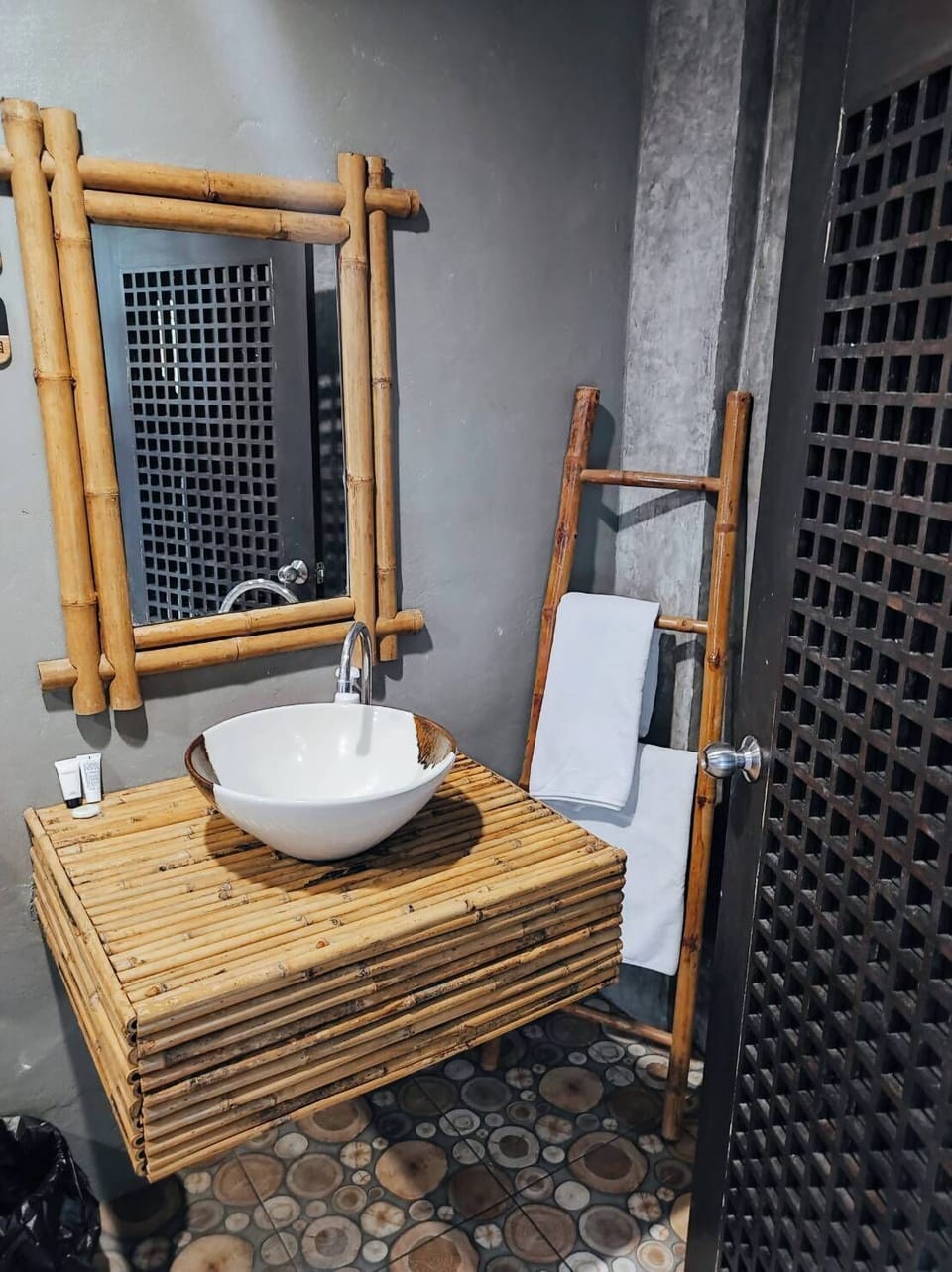Sumo Village | Bathroom | Shower, designer toiletries, hair dryer, towels