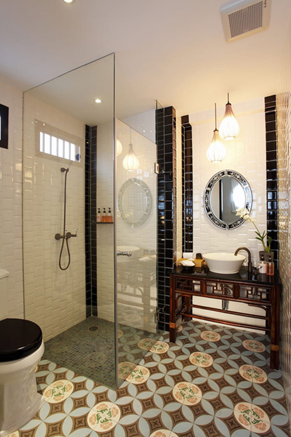 Shower, designer toiletries, hair dryer, bathrobes