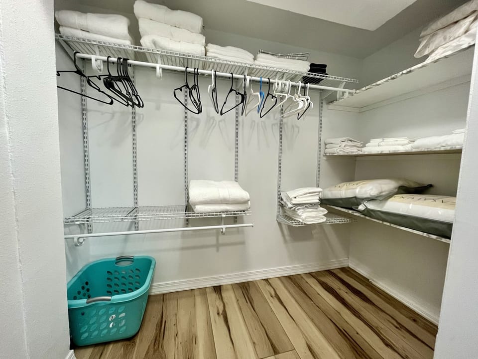Extra large walk-in closet.