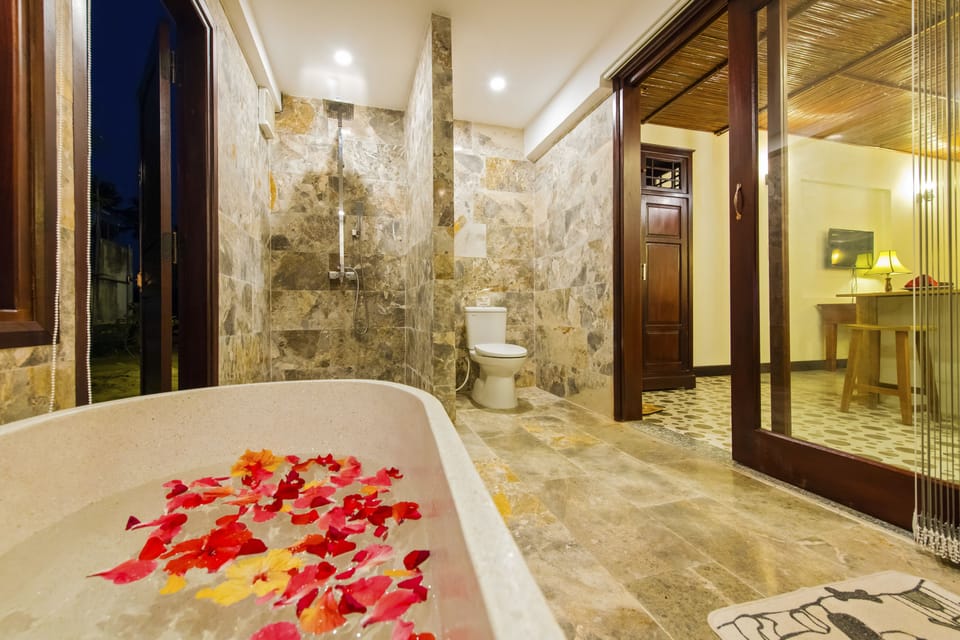 Shower, free toiletries, hair dryer, slippers