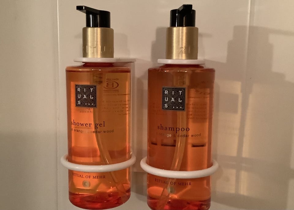 Designer toiletries, hair dryer, towels, soap