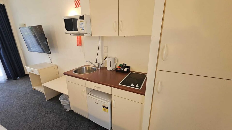 Self-contained Queen Studio | Private kitchenette | Fridge, microwave, electric kettle, toaster