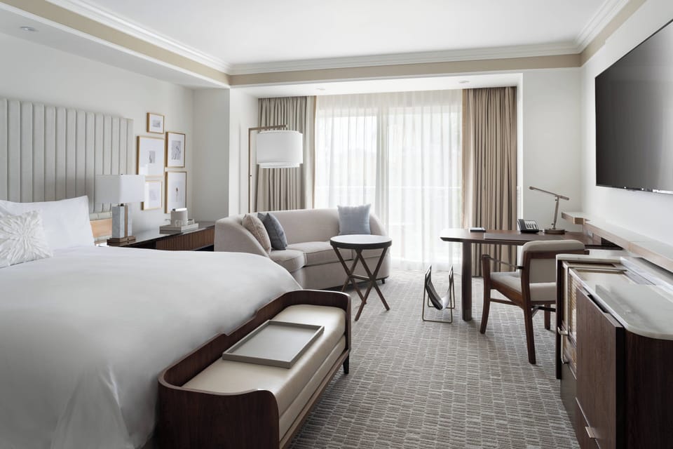 Premium bedding, down comforters, minibar, in-room safe