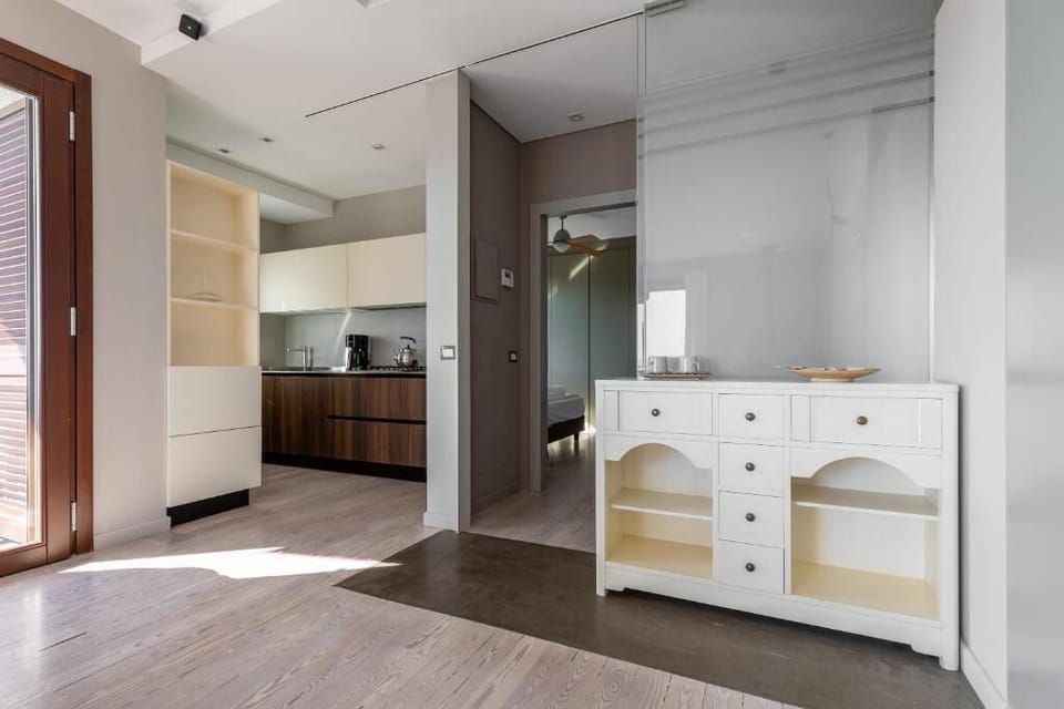 Deluxe Apartment | Private kitchen | Full-size fridge, microwave, coffee/tea maker, electric kettle