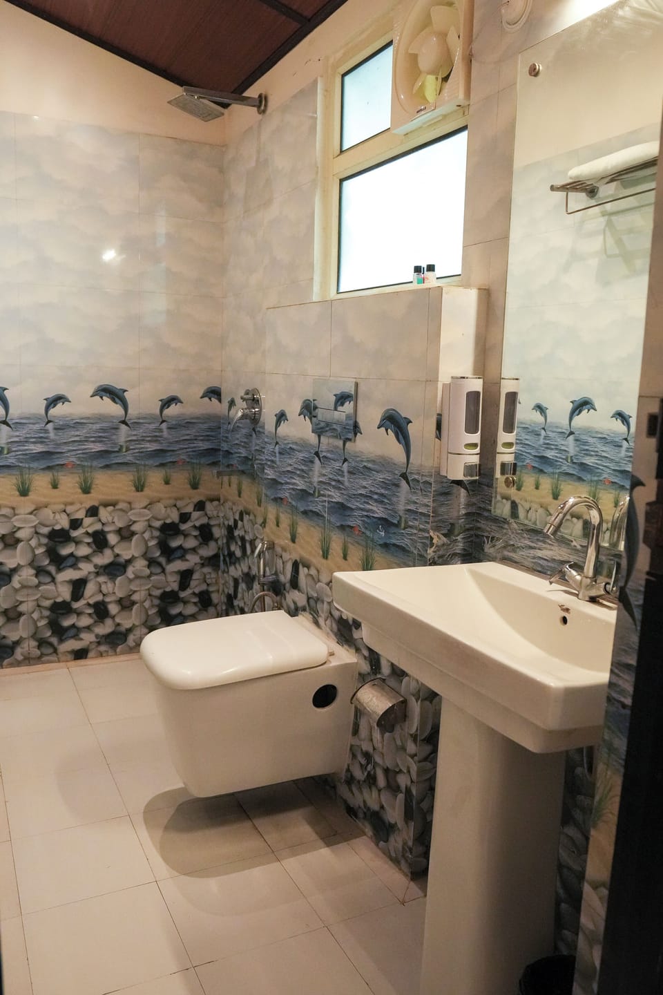 Shower, towels, soap, toilet paper